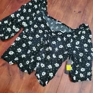 Sold. No boundaries floral top